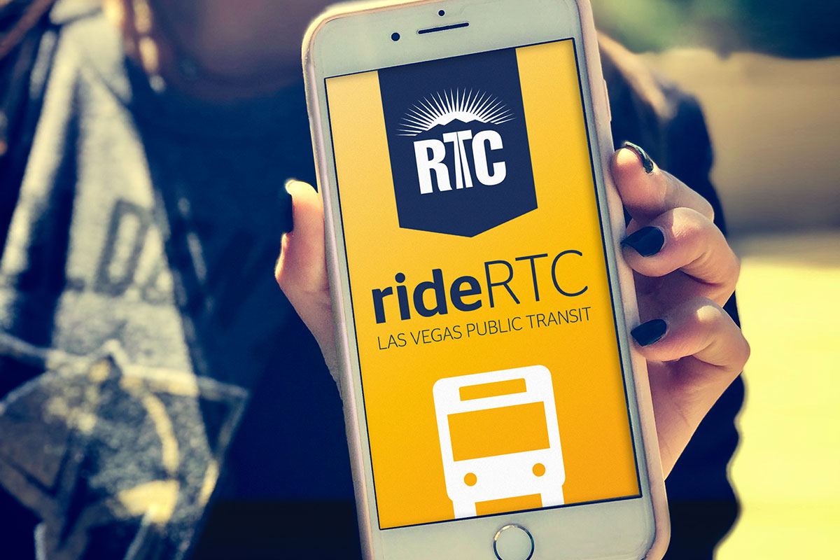 Girl holding out iPhone with rideRTC app loaded Girl holding out iPhone with rideRTC app loaded